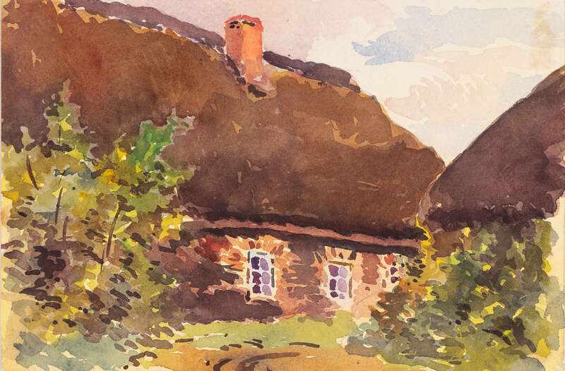 Bauernhaus hinter Büschen